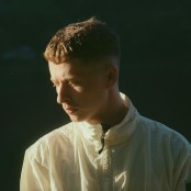 Sam Gellaitry wearing a white jacket